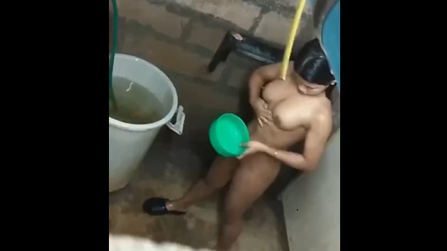 Recording a Busty Latina Taking Shower