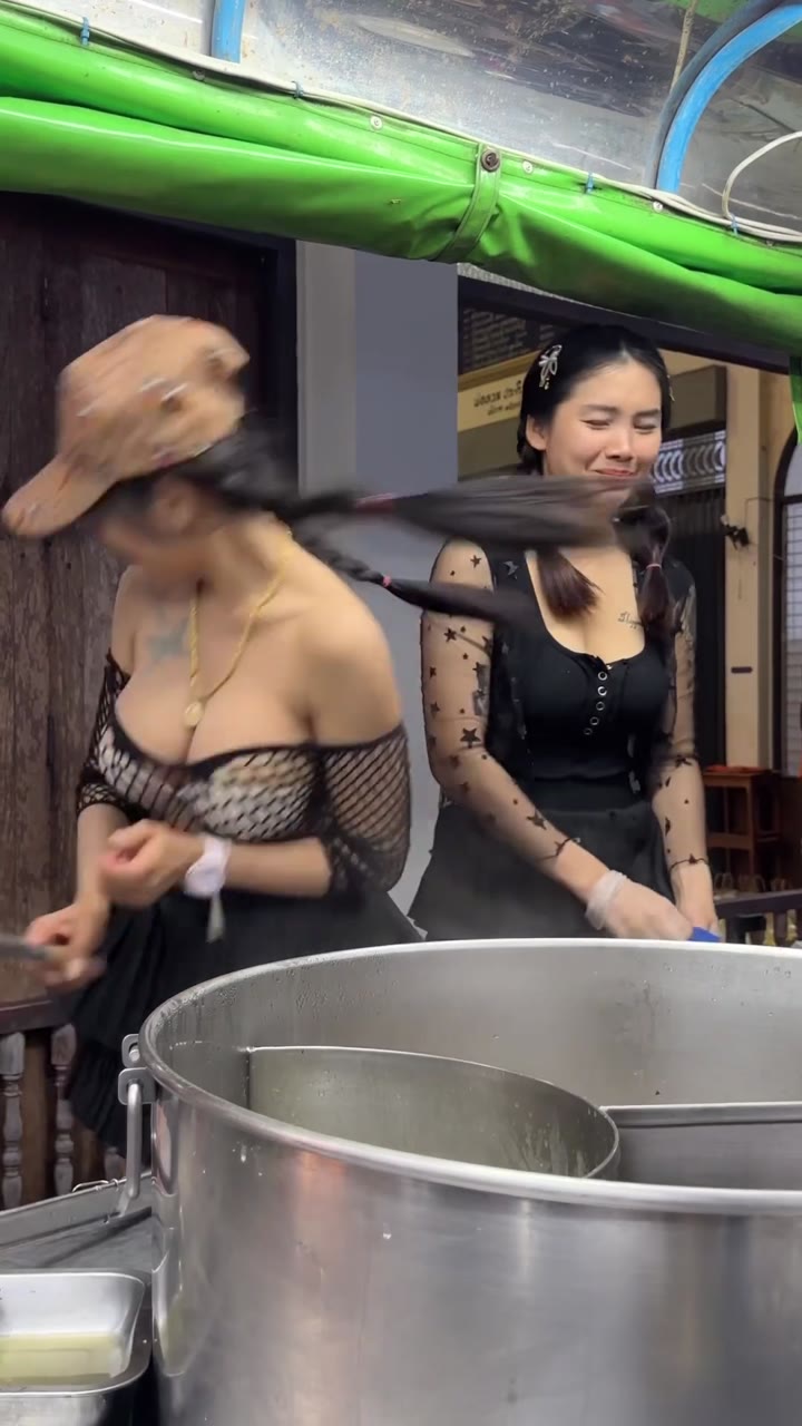 Beautiful Funny Lady Chef Cooks Delicious Pork Noodle