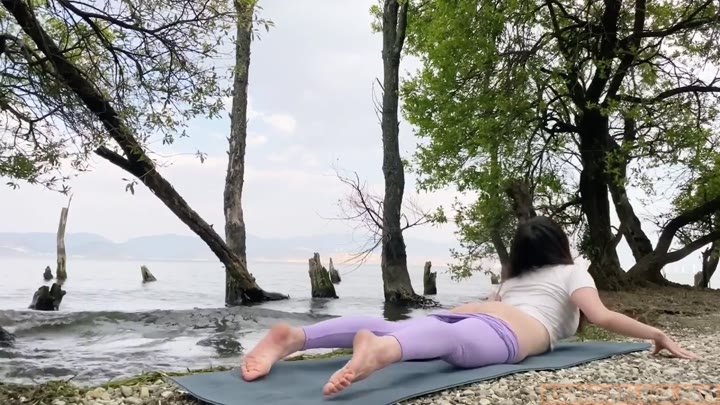 ZhouYiQin Shows Her Busty Ass While Doing Yoga By The River ASMR Video