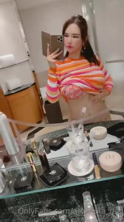 Watch Anri Okita Teases with Sweater Nipples