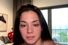 Vladislava Galagan Teasing in a Blue Tank Top with a Spiderman toy in her Mouth